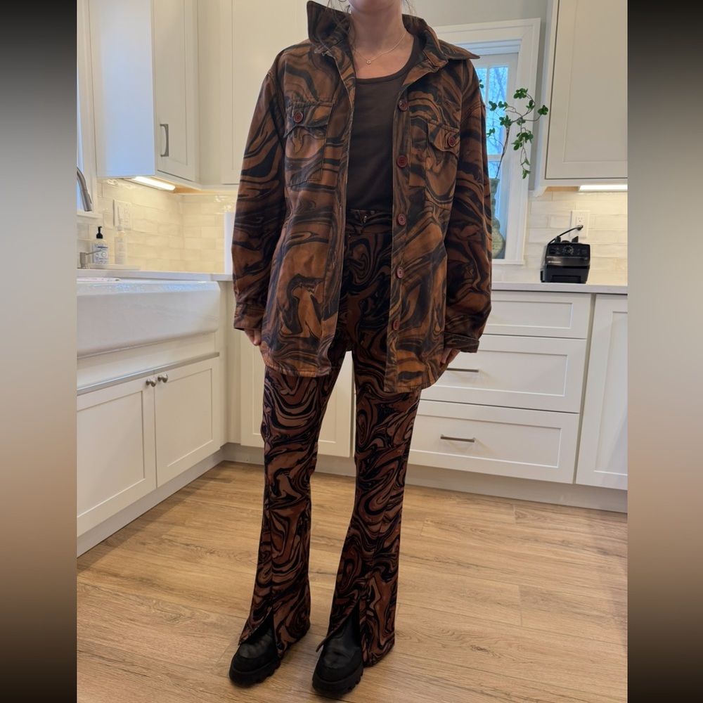 House of Sunny Mahogany Paradise flare pants with a brown swirl marble print